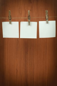 white memory note paper hanging on cord