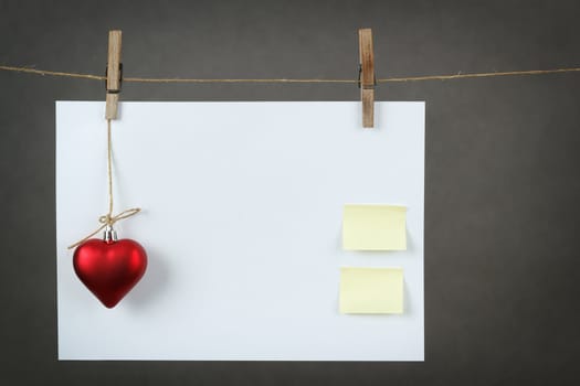 empty note for valentine message on red background