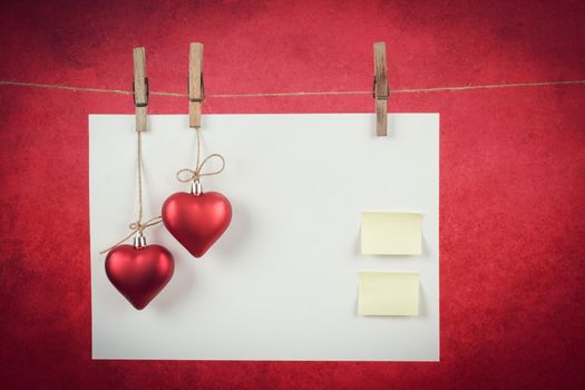 empty note for valentine message on red background