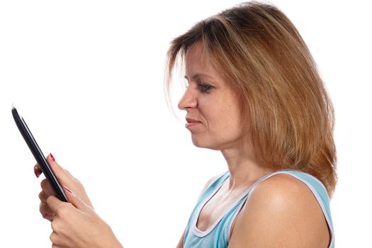 woman using ebook reader or digital tablet computer