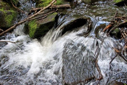 Closeup of a crystal clear fast creek