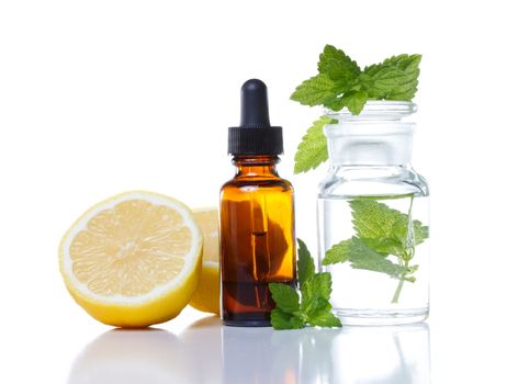 Herbal medicine dropper bottle with lemon and mint