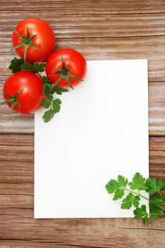 Tomatoes on Wood with white notepad