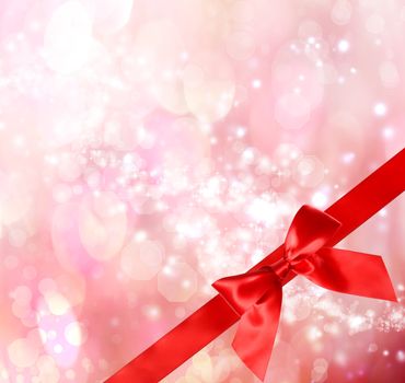 Red Bow and Ribbon with  Pink Bokeh Lights Background 