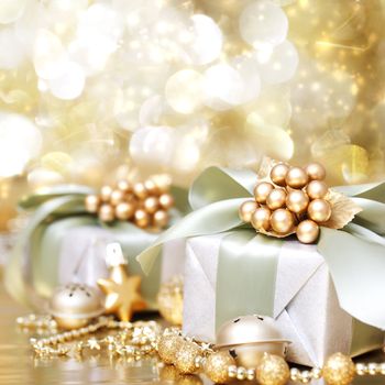 Christmas Gift Box over Golden Shiny Background