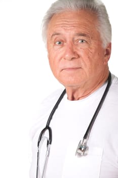 Senior male doctor with grey hair friendly with stethoscope