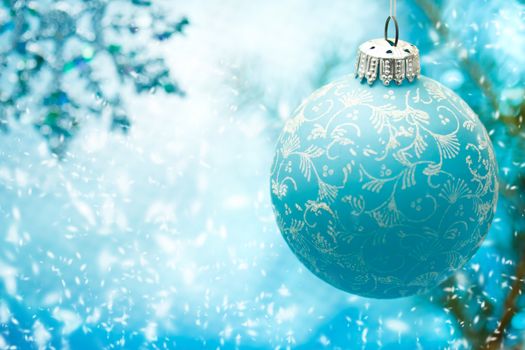 Blue Christmas ornament with snow flakes