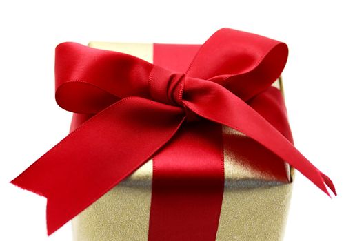 Gift box with red ribbon on white background