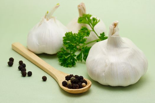 Food ingredients - garlic, parsley and peppercorn