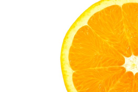 Slice of orange on white background