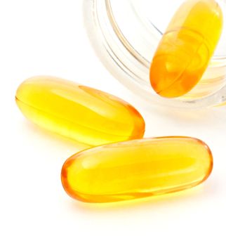 Three Yellow Gel Capsules with Jar