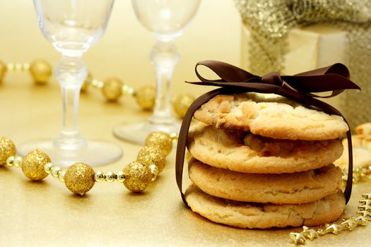 Christmas cookies with wine glasses and gift box
