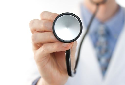 Doctor with stethoscope over white background