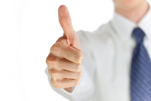 Young businessman showing thumb up over white background