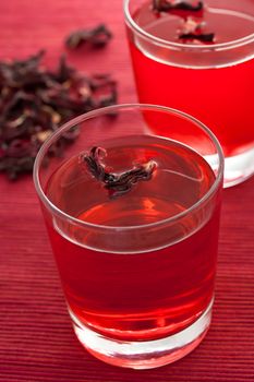 Hibiscus herbal tea in glass cup