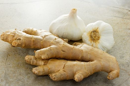 Ginger and garlic on the stone table