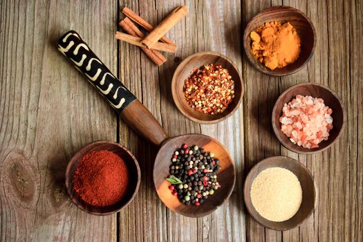 Collection of spices in wooden bowls