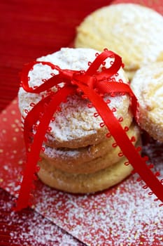 Christmas powdered cookies with red ribbon