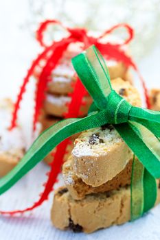 Biscotti and cookies with powdered sugar and ribbon