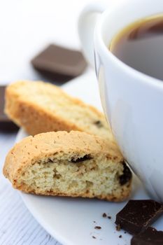 Biscotti and chocolate with a cup of coffee
