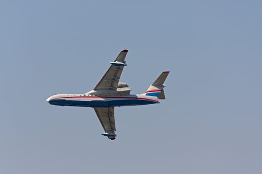 Airplane close-up on  background of blue sky, Russia.