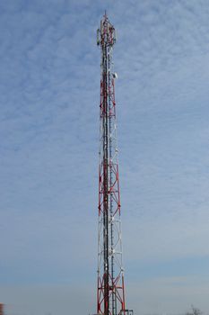 Antenna tower for mobile phone with blue sky background