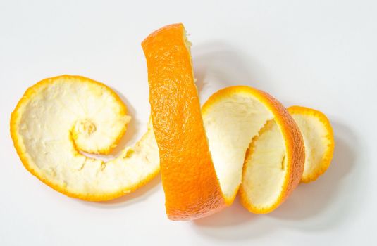 The skin from a peeled citrus fruit