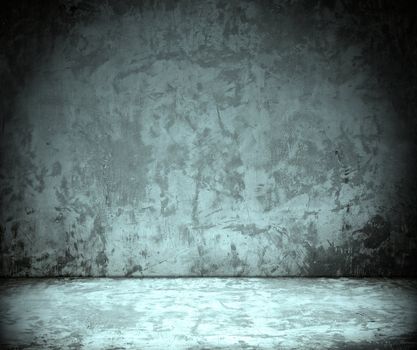 empty room with grunge concrete wall and cement floor