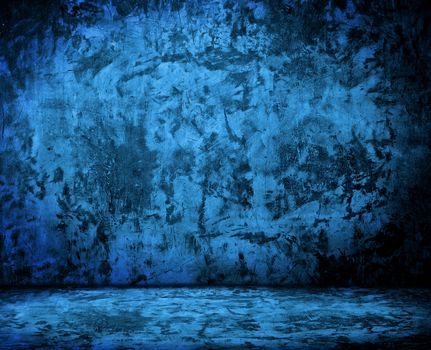 blue empty room with grunge concrete wall and cement floor