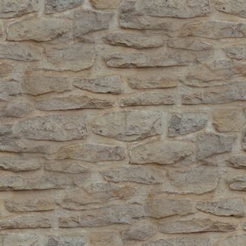 Seamless textured background of a rubble stone wall