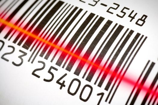 Package tracking barcode being read by a scanner. 