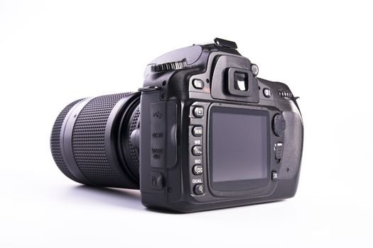 A DSLR camera mounted with a pro lens standard zoom.