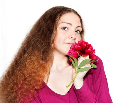 Beautiful girl with a pion in the hands isolated on white background
