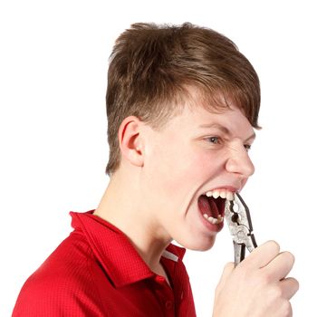 boy pulled himself  teeth with pliers against white background