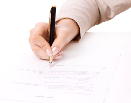Close up of female hand signing a contract, mortgage