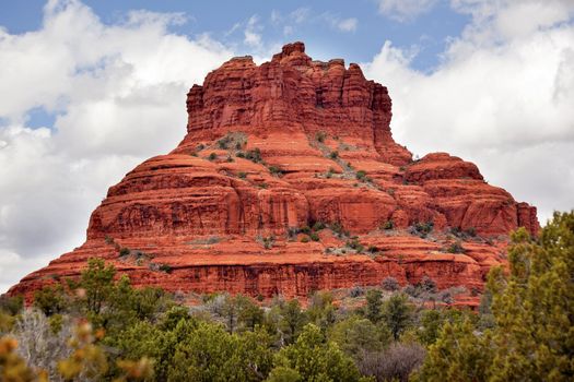 Bell Rock Butte Orange Red Rock Canyon Blue Cloudy Sky Green Trees Snow Sedona Arizona