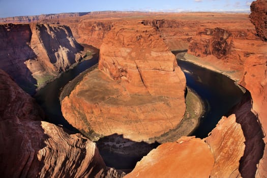 From the Rim Horseshoe Bend Orange Glen Canyon Overlook Small Boat Blue Colorado River Entrenched Meander Page Arizona