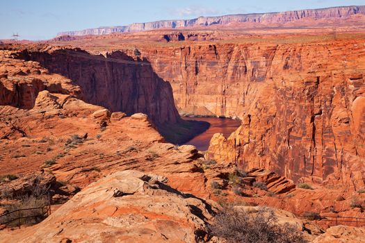 Electric Lines Over Colorado River Orange Canyon Downstream from Glen Canyon Dam Arizona.