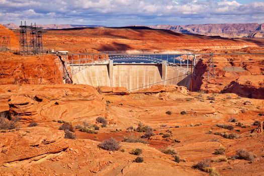 Glen Canyon Dam Bridge Lake Powell Arizona.  Orange Canyon and Electric Power Lines.