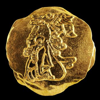 Ancient sign of the Mayan culture in the gold medallion