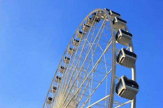 Ferris wheel with clear blue sky