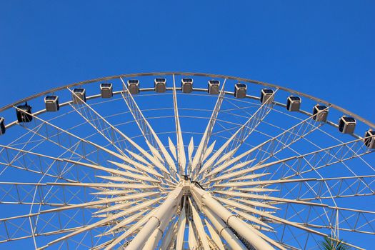 Ferris wheel with clear blue sky