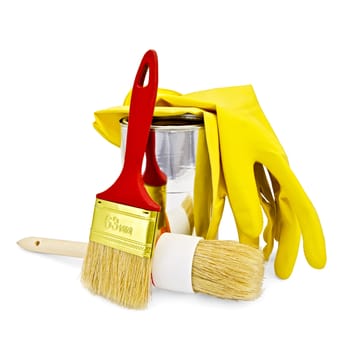 Two brushes of different sizes with yellow gloves and a jar isolated on white background