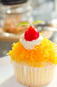 close up of gold egg yolks thread cake
