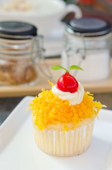  thai dessert on white pleat , or call it " cake foi thong"