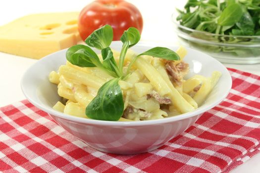 Pasta Carbonara with ham and corn salad