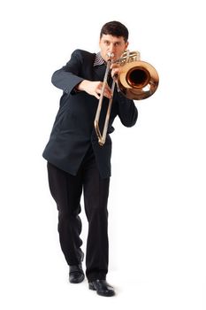 Young man playing his trombone.