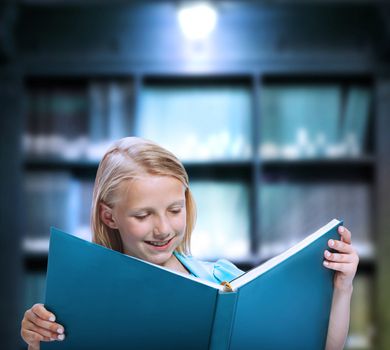 Little Girl Reading a Big Book in a Library