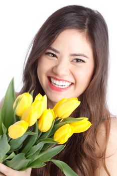Beautiful Young Women Holding Yellow Tulips