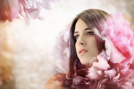 Beautiful Girl in Elegant Pink Flower Background